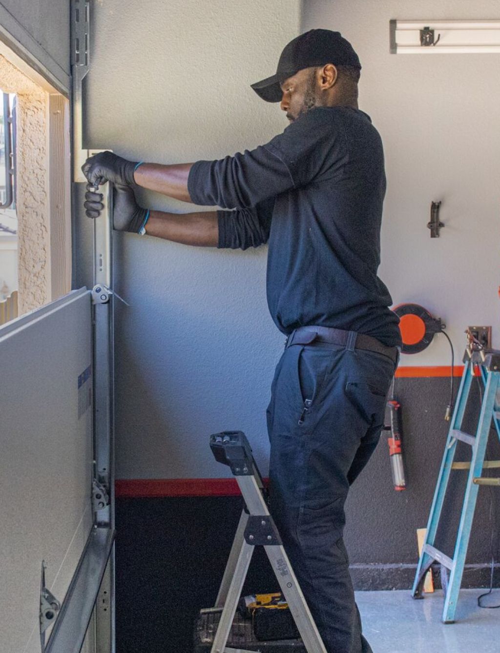 Technician setting up calibrated blower door